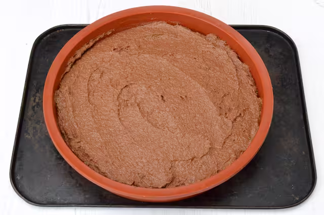 Levelled batter in silicone mould prior to baking.