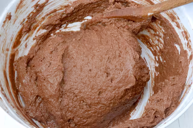 Chocolate almond cake batter thoroughly mixed.