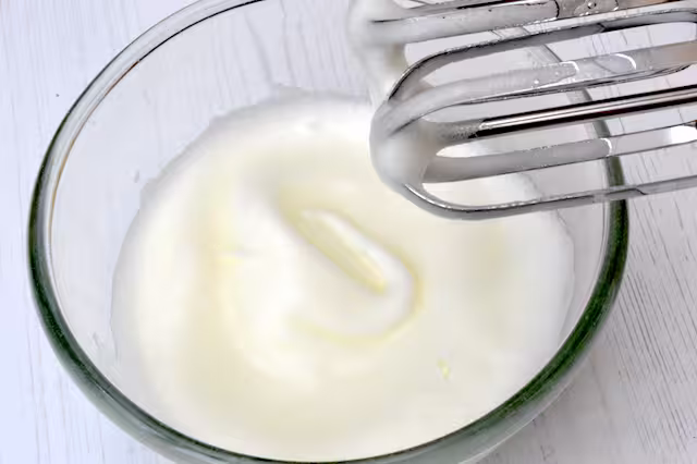 Egg whites whisked until stiff.