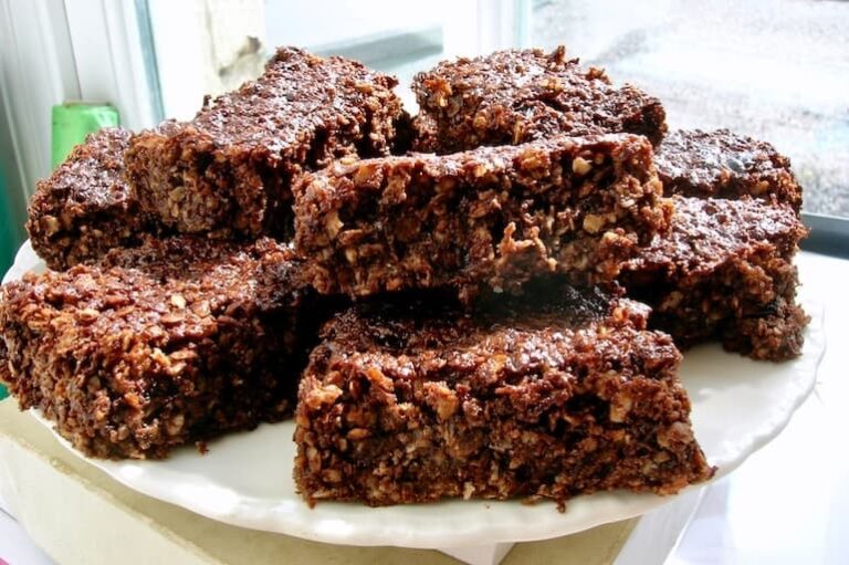 Homemade chocolate coconut flapjacks on plate.
