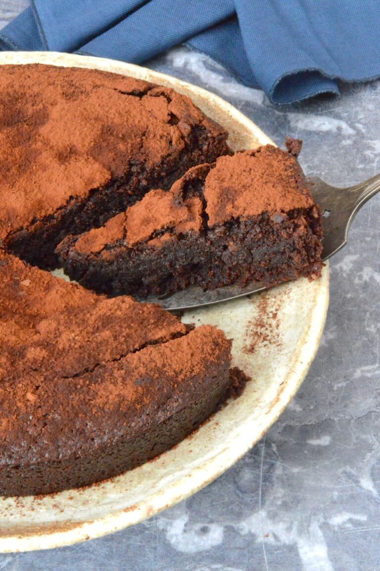 Slice cut from the main chocolate mayonnaise cake.