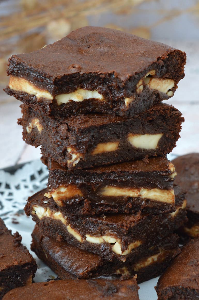 Close up of a cream cheese brownie stack..