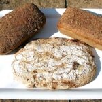 Chocolate chilli lime bread loaf with two rye sourdough loaves.