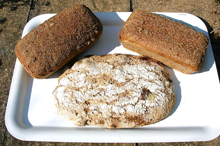 Chocolate chilli lime bread loaf with two rye sourdough loaves.