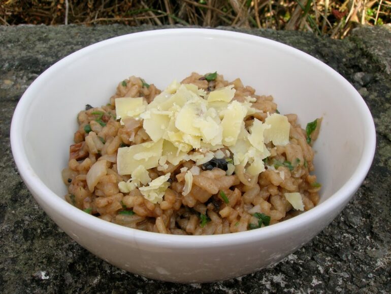 A bowl of dried mushroom risotto with chocolate.