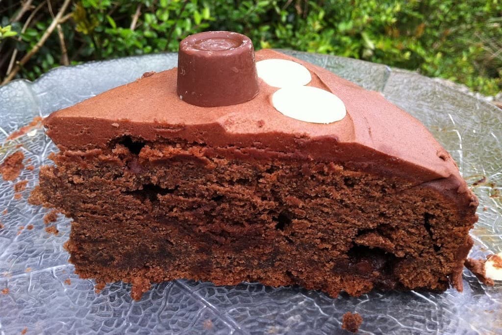 A slice of chocolate rolo cake.