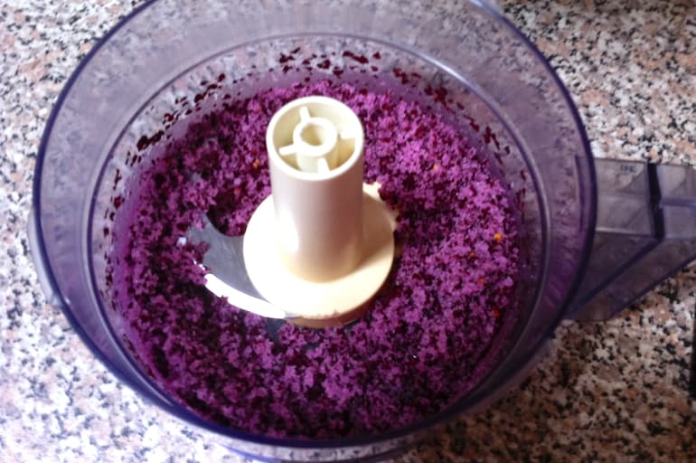 Whizzing rose sugar in food processor.