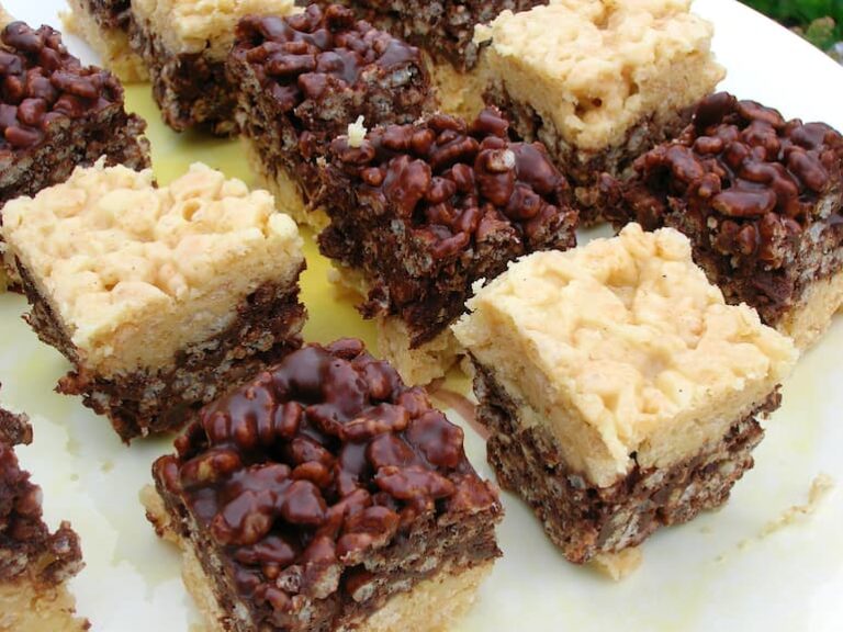 Close up of two tone crispy squares on a plate.