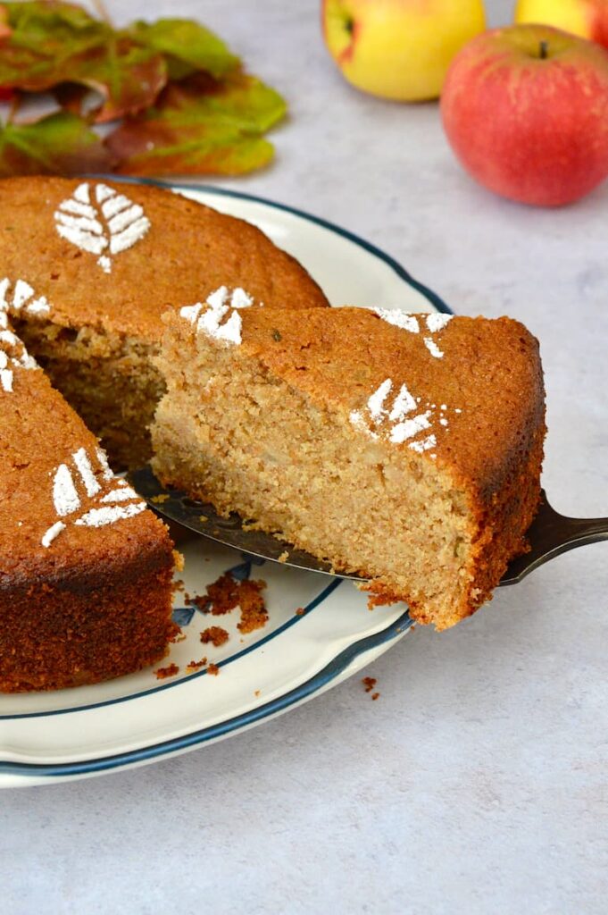A slice of apple and thyme cake. One of 80 seasonal and delicious apple recipes.