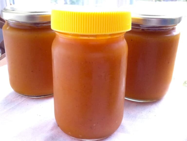 Three jars of homemade pumpkin butter.
