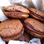 A box of homemade chocolate macaroons.