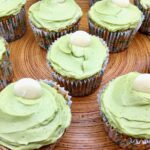 Close up of matcha cupcakes with white chocolate buttons.
