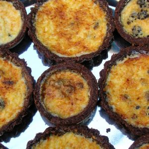 Homemade Yorkshire curd tarts with chocolate pastry.
