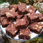 Plate piled with swirled peanut butter brownies.