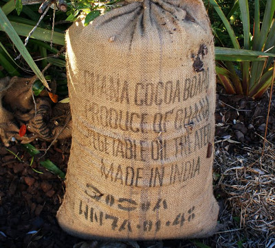 A sack of cocoa bean husks.