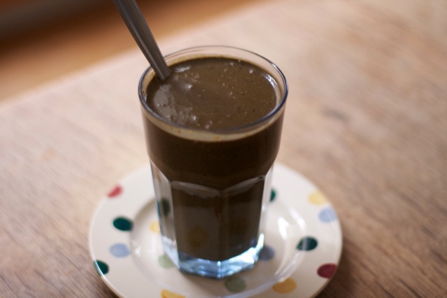 A glass of detox chocolate drink.