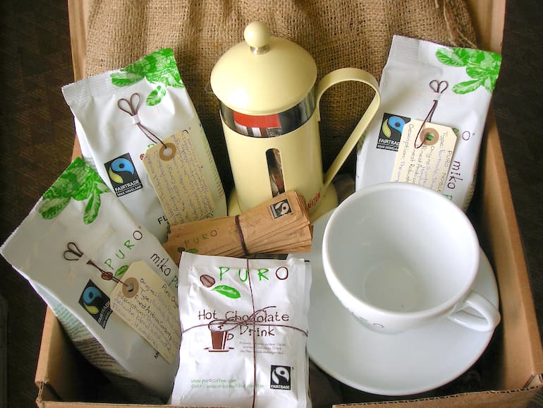 Box of Puro products including coffee, hot chocolate, cafetiere and cup.