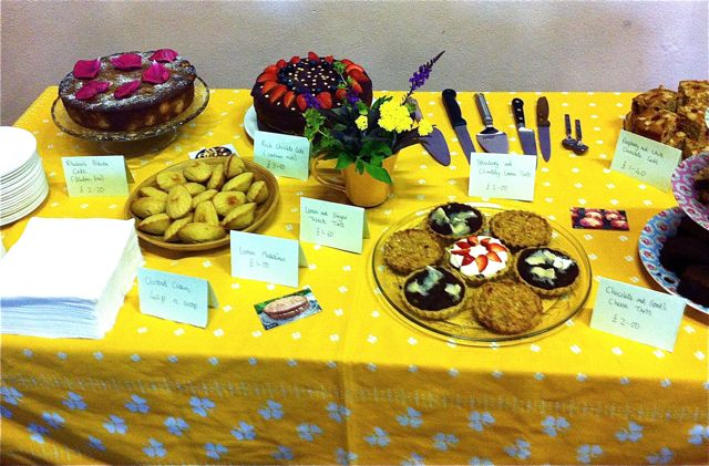 Liskeard Pop-Up Cafe with a table loaded with cakes and other bakes.