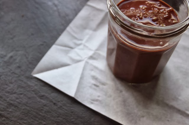 An open jar of chocolate port sauce.