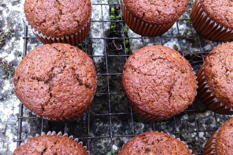 Wensleydale Cheese Chocolate Muffins cooling on a wire rack.