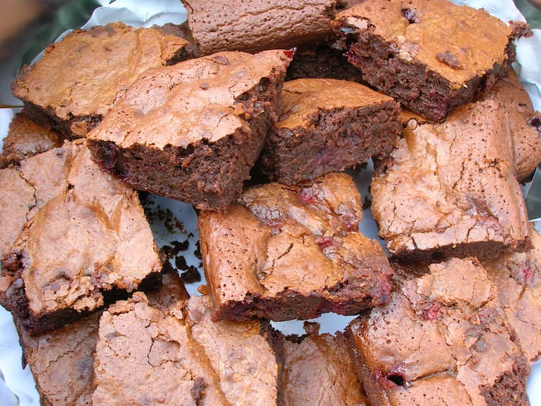 Plate full of blackcurrant brownies.