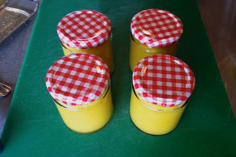 Four jars of lemon curd made on preserves course.