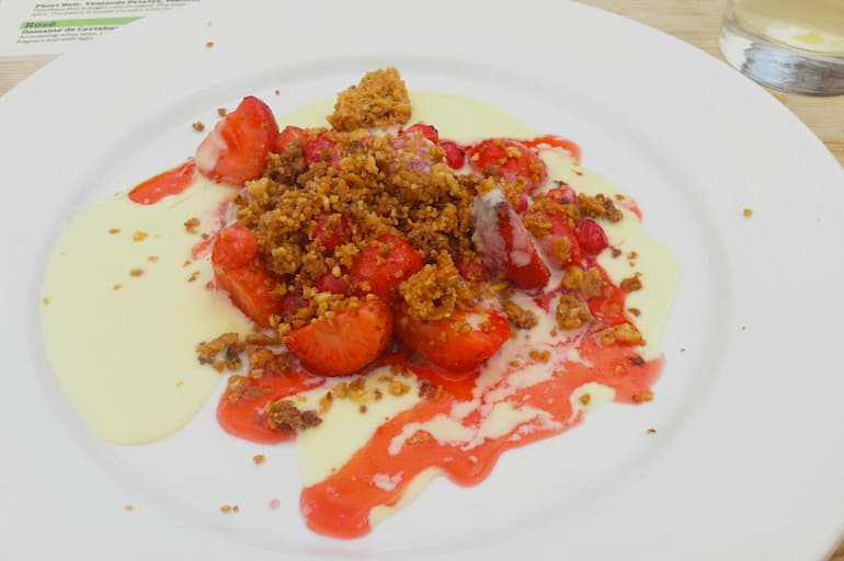 Plate of strawberry gooseberry crumble.