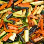 Spiced roasted summer vegetables ready to go into the oven.
