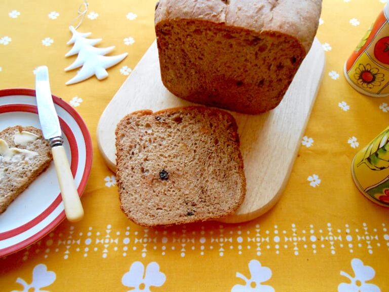 A slice of bread maker panettone cut from a loaf.