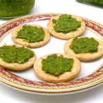 Crackers spread with fat hen and chickweed pesto.