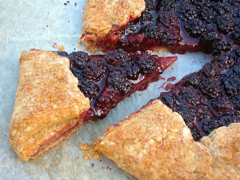 Slice of homemade double blackberry galette.