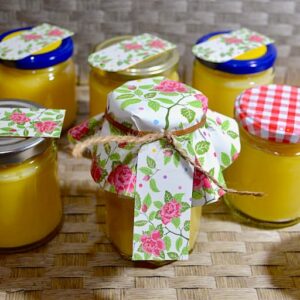 Jars of homemade lemon curd with labels.