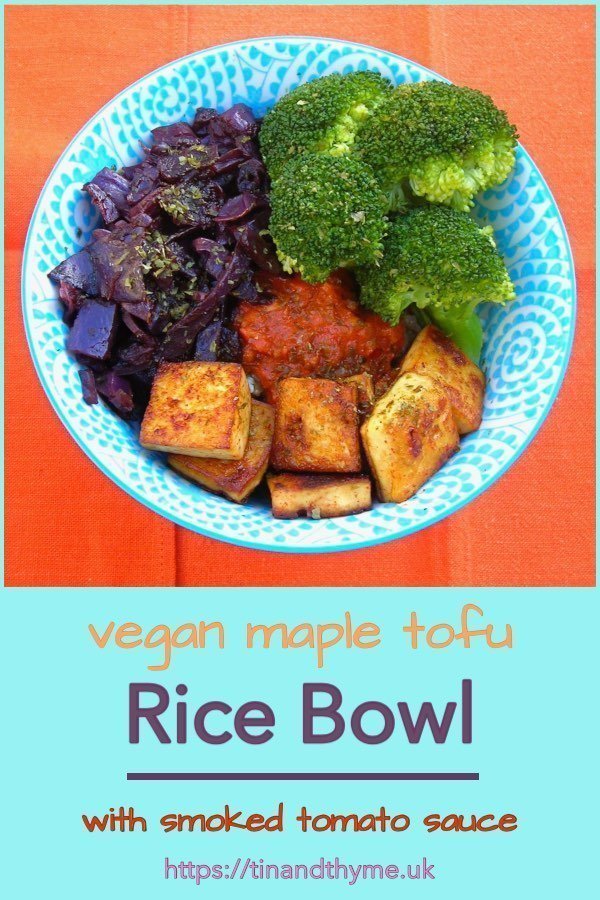 Vegan Rice Bowl with maple marinaded tofu, broccoli, purple cabbage and smoked tomato sauce.