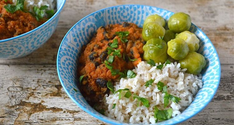 A black bean tomato carrot curry bowl.