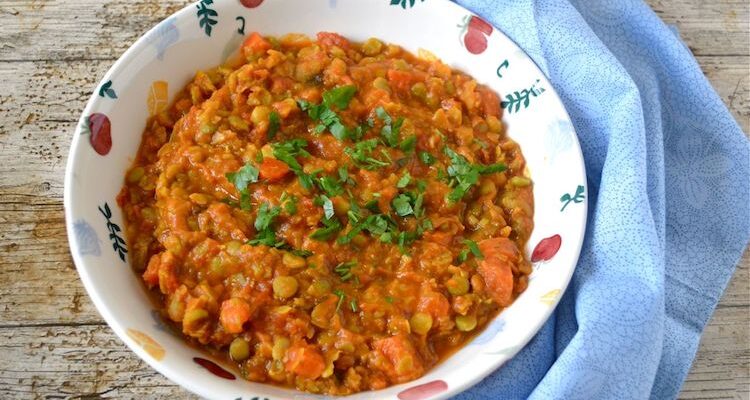 A bowl of green split pea curry.