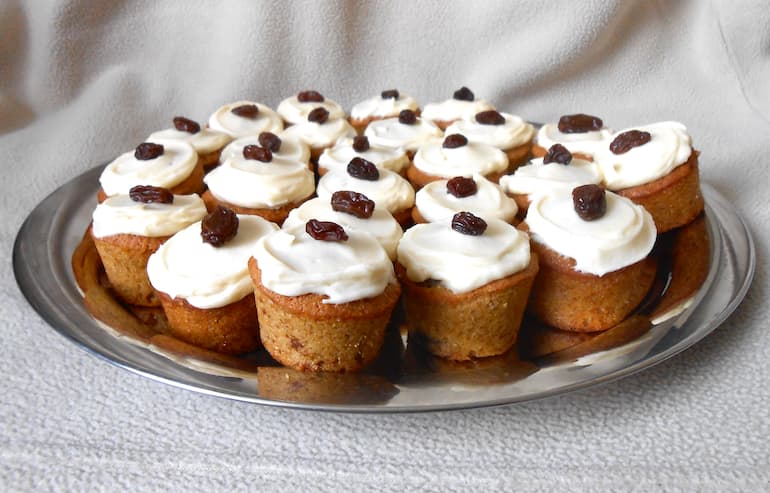 Tray of homemade min rum and raisin cupcakes.