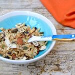 Bowl of easy homemade vegan honey almond granola.