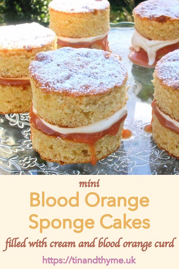 Miniature Blood Orange Sponge Cakes filled with cream and blood orange curd.