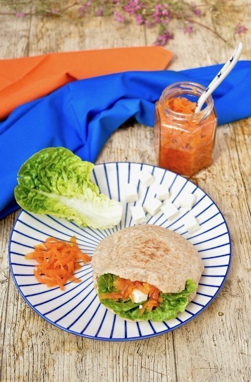 Persian Carrot Jam (Moraba-ye Havij) served with feta cheese and lettuce in a pita bread.