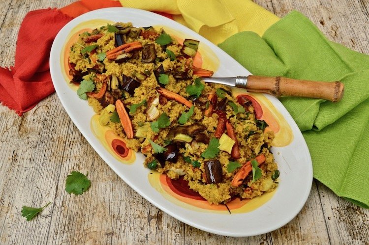 Serving platter with aubergine carrot couscous.