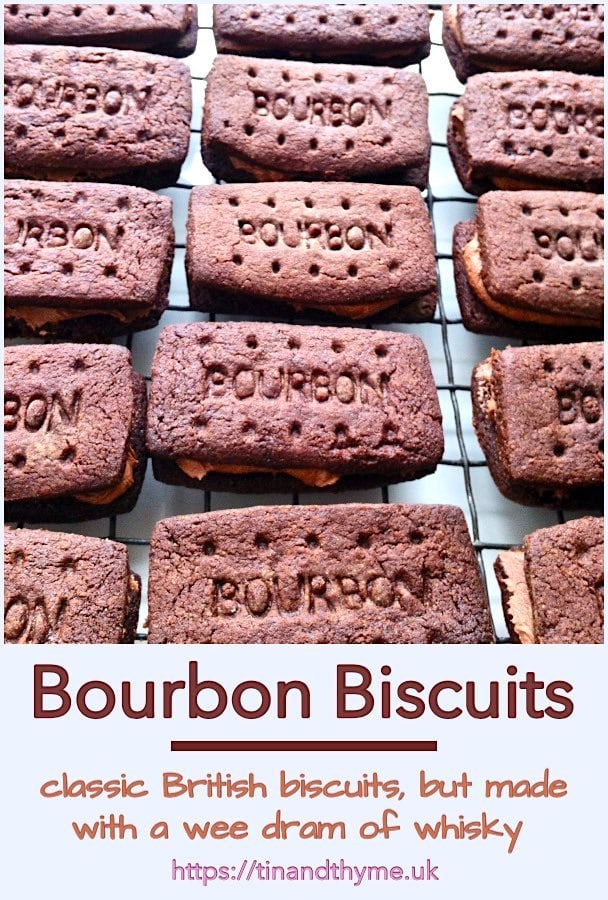 Homemade bourbon biscuits cooling on a wire rack.