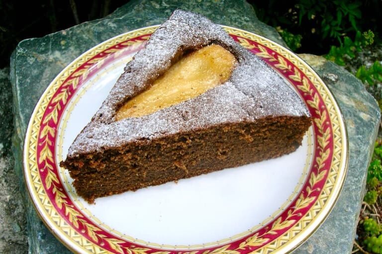 Slice of caramelised pear and honey carob cake.