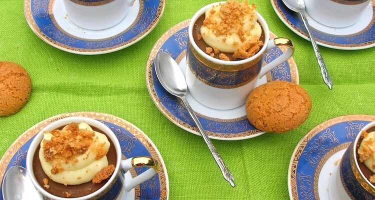 Amaretto Pots au Chocolat with whipped white chocolate ganache and amaretti biscuits.