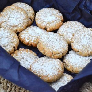 Maamoul cookies in a basket with two fillings.