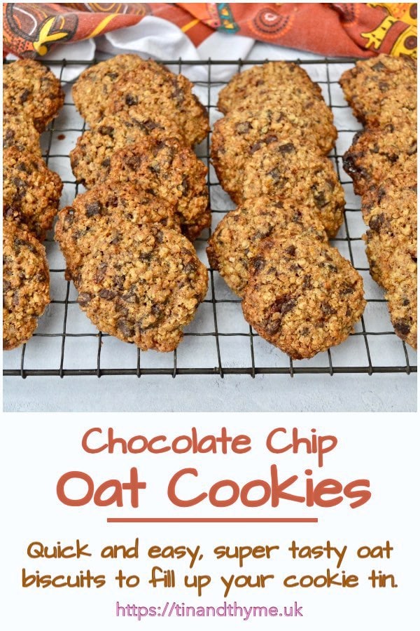 Chocolate Chip Oat Cookies cooking on a wire rack.