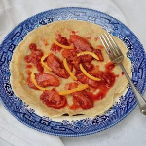 Wholemeal Pancake topped with sticky blood oranges.