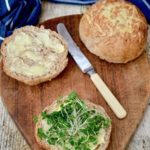 Wholemeal cheese baps with butter and cress.