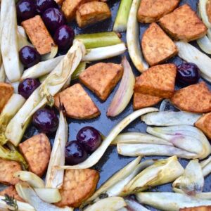 Roasting marinated tempeh, grapes and fennel.