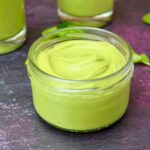 Open jar of watercress pesto.