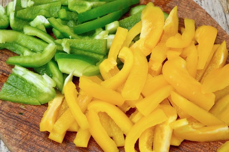 Sliced yellow and green peppers.